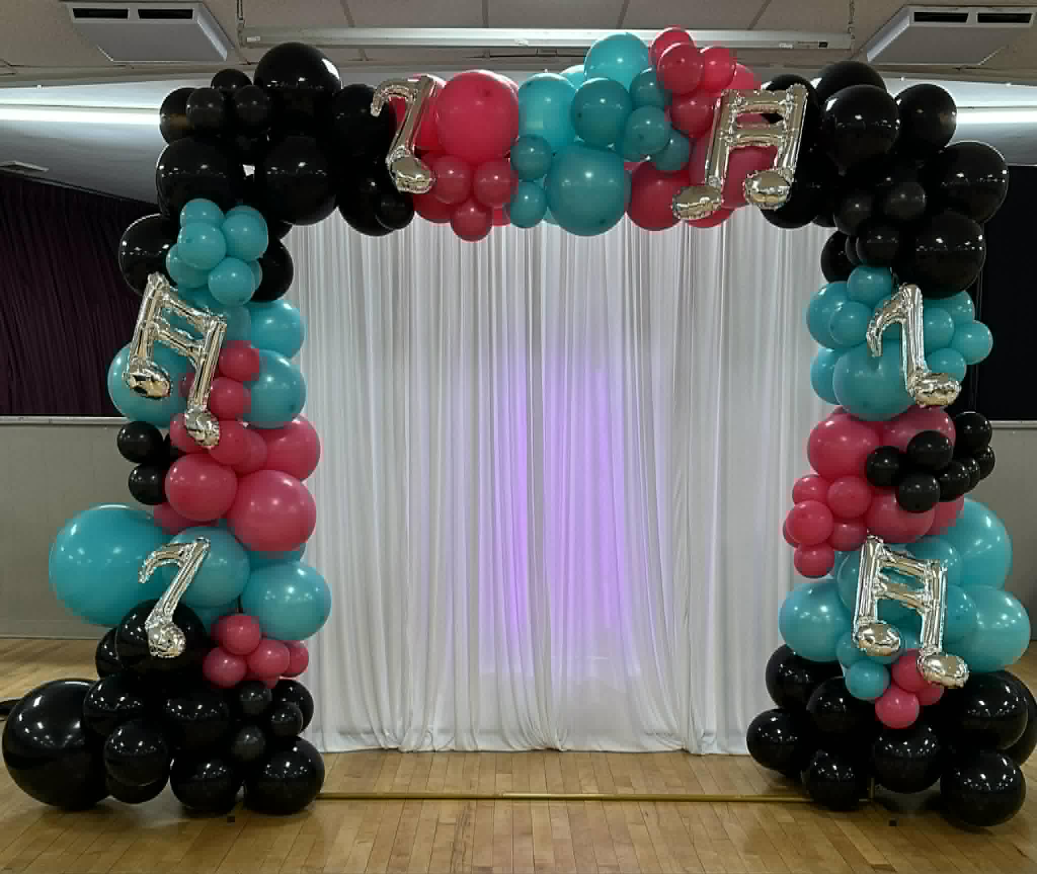 Custom balloon arch installation